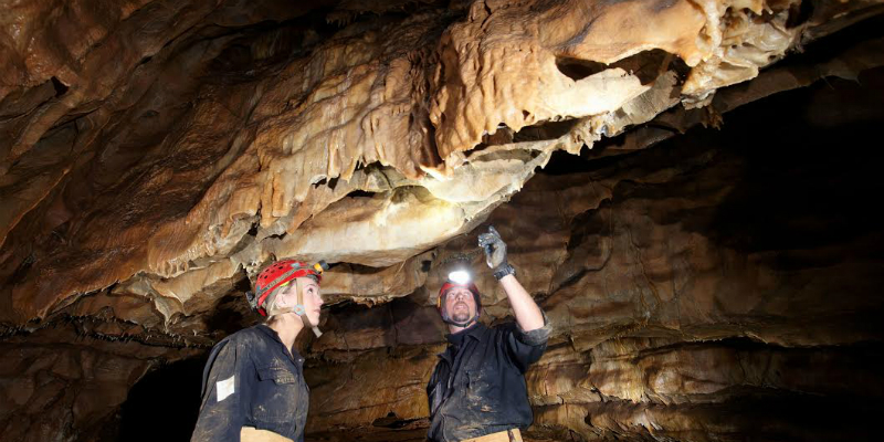 cavers in the Adventure Caves, Cheddar Gorge, Somerset, England, UK